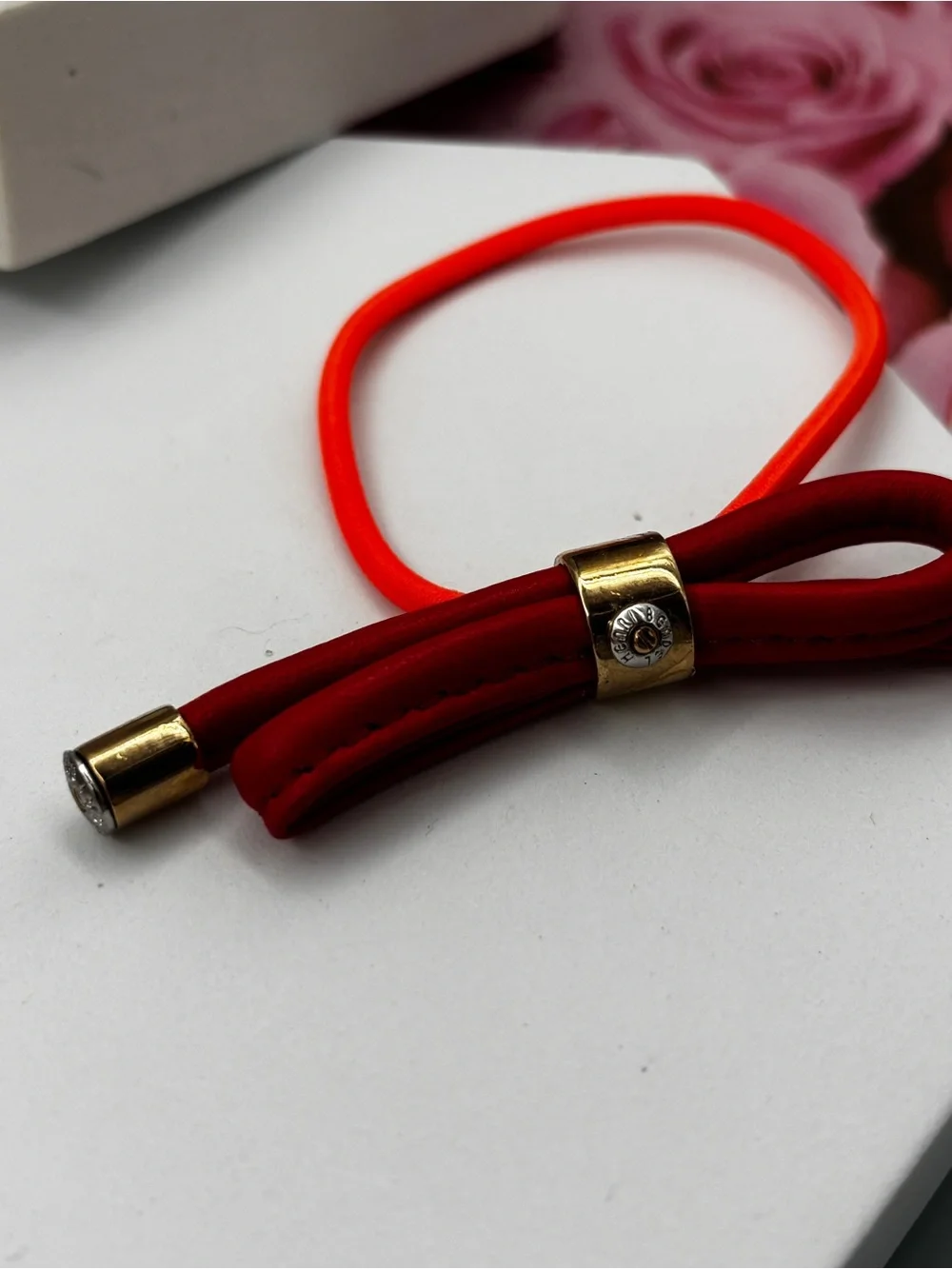Henri Bendel Gold Tone leather bow Iconic Signed Hair Tie Pony-tail Holder